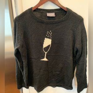Gray sweater with champagne glass